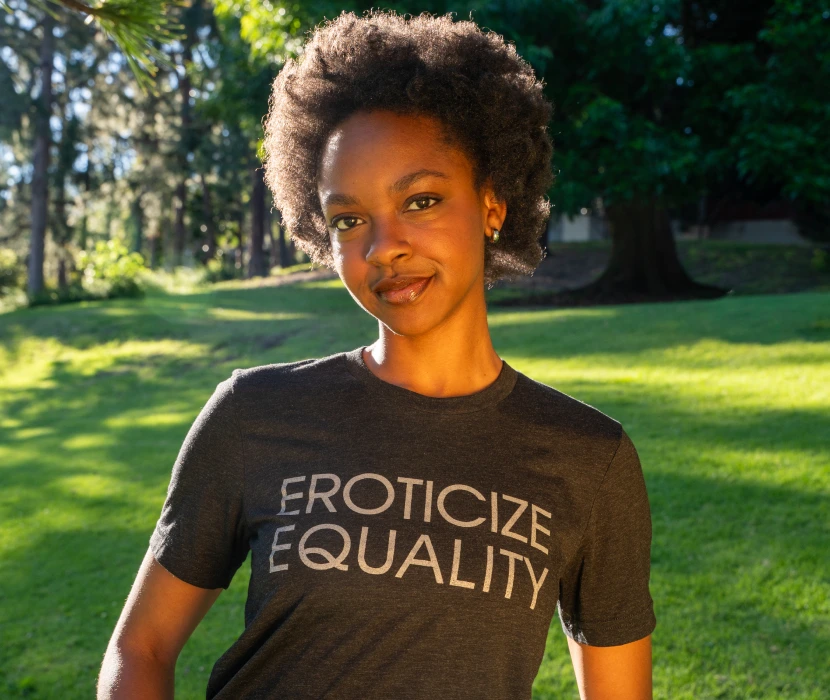 Woman wearing 'Eroticize Equality' t-shirt